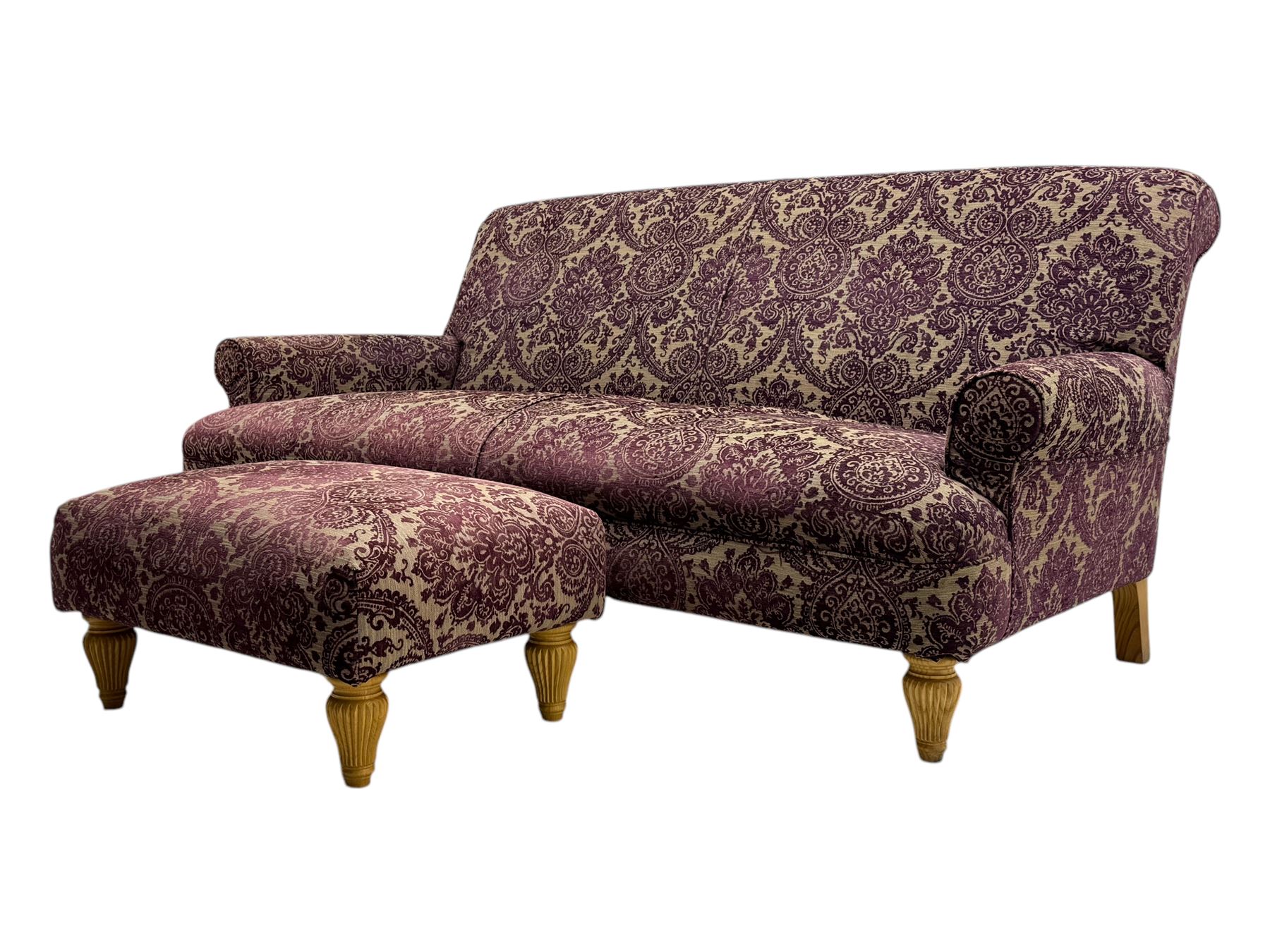 Multi-York - contemporary two-seat sofa, upholstered in damask fabric in shades of burgundy and beige, raised on turned and fluted supports; complete with matching footstool