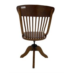 Early 20th century office oak adjustable swivel chair with studded leather seat