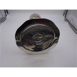 German silver chalice, the bowl, stem and foot each with 19th century repousse and chased decoration depicting putti masks, C scrolls and flowers, set with two hand painted porcelain roundels, possibly Berlin, and six later applied enamel roundels, each depicting religious scenes, the gilded bowl upon knopped stem and spreading octofoil foot, the base with marks for Munich, c.1695 and maker's mark FK