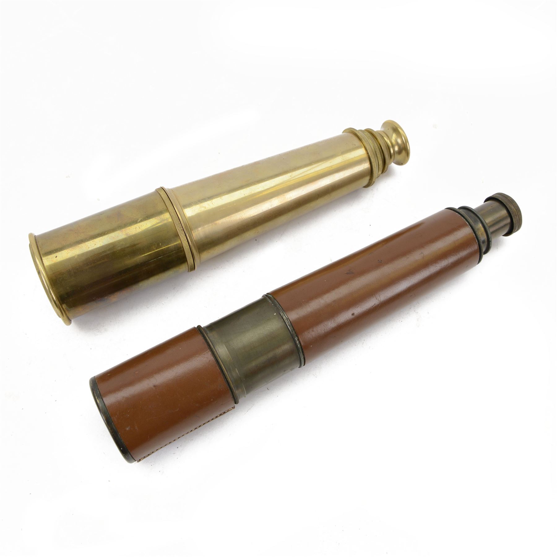 British WWII brass and leather telescope, marked tele. sct. regts mkII, with broad arrow,  mark, together with a brass three draw telescope 