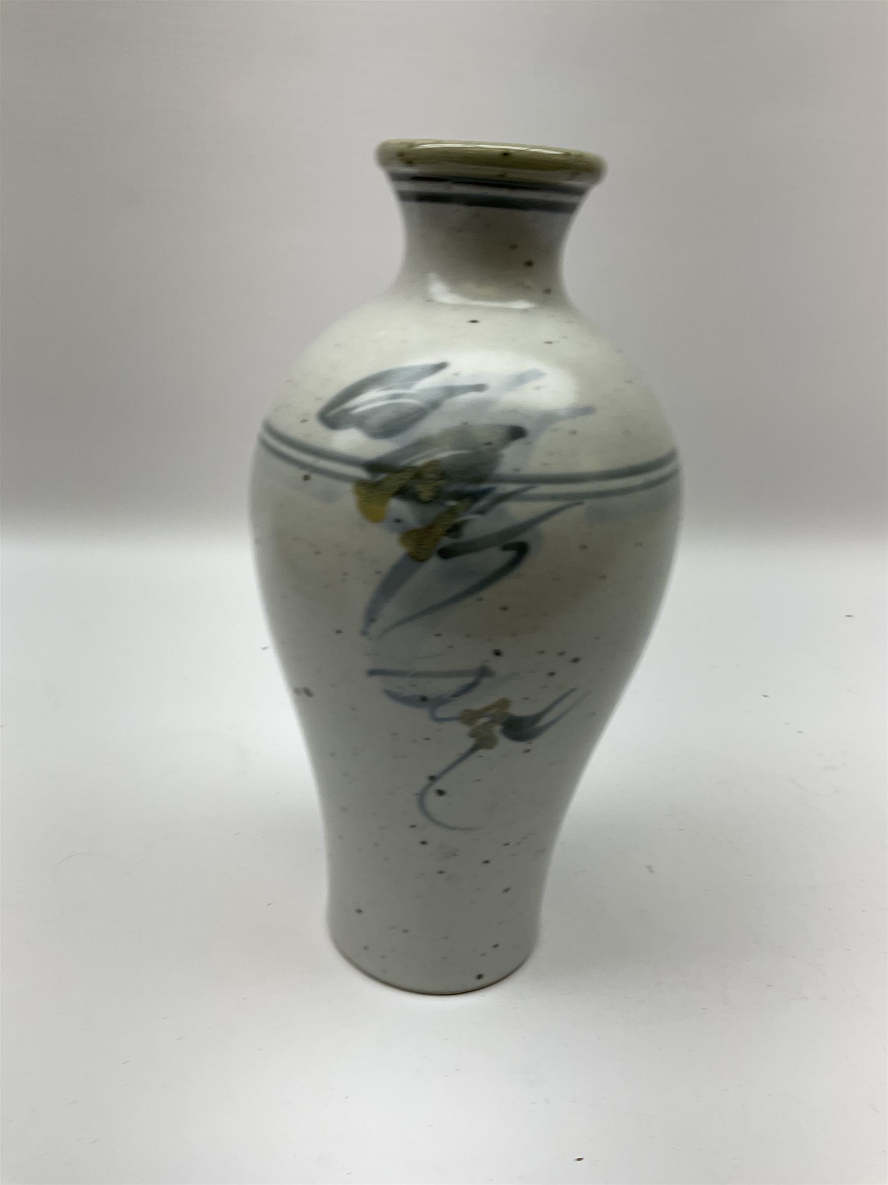 Studio pottery vase of baluster form with a light mottled blue ground with abstract painted decoration, H26cm