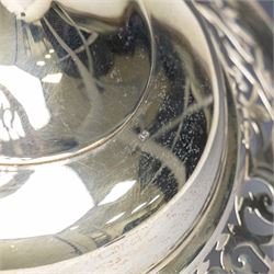 Early 20th century silver twin handled tazza, the bowl of circular form with pierced foliate decoration and ribbon and reed border, with two whiplash curved handles, upon a knopped stem and pieced foliate foot, hallmarked Walker & Hall, Sheffield 1911, H20cm