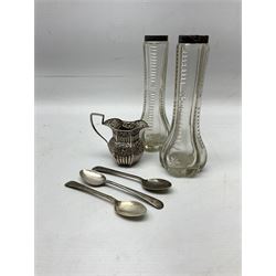 Set of three silver teaspoons, hallmarked Pinder Brothers, Sheffield 1946, together with late 19th century jug with repousse foliate decoration, hallmarked Lines, Bunn & Mason, Birmingham 1898, and pair of cut glass vases with silver collars, total weighable silver weight approx 108g