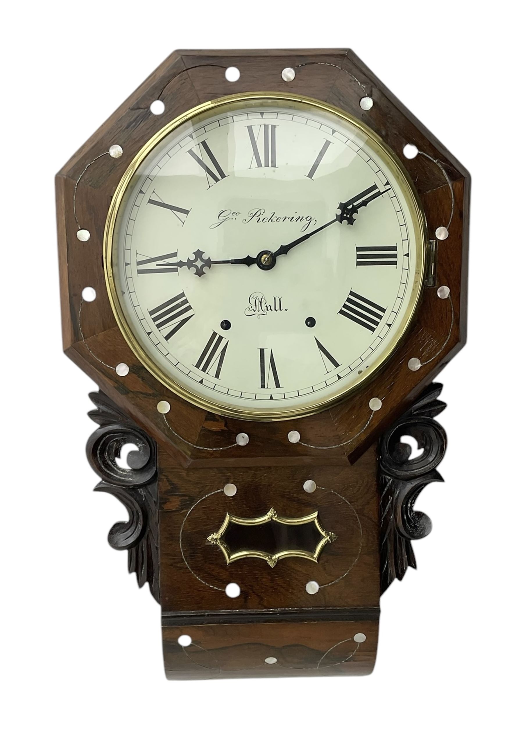 George Pickering of Hull - 8-day American mahogany and mother of pearl inlaid drop dial wall clock c 1880, with an octagonal dial surround and spun brass bezel, painted dial with Roman numerals, minute track, retailers name and Maltese cross hands, case with an ogee base, carved ears and pendulum viewing glass, twin train spring driven movement striking the hours on a bell.  With key and pendulum.