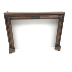 Early 20th century mahogany fire surround, moulded frame with foliage cared detailing, W145cm, H110cm, D20cm