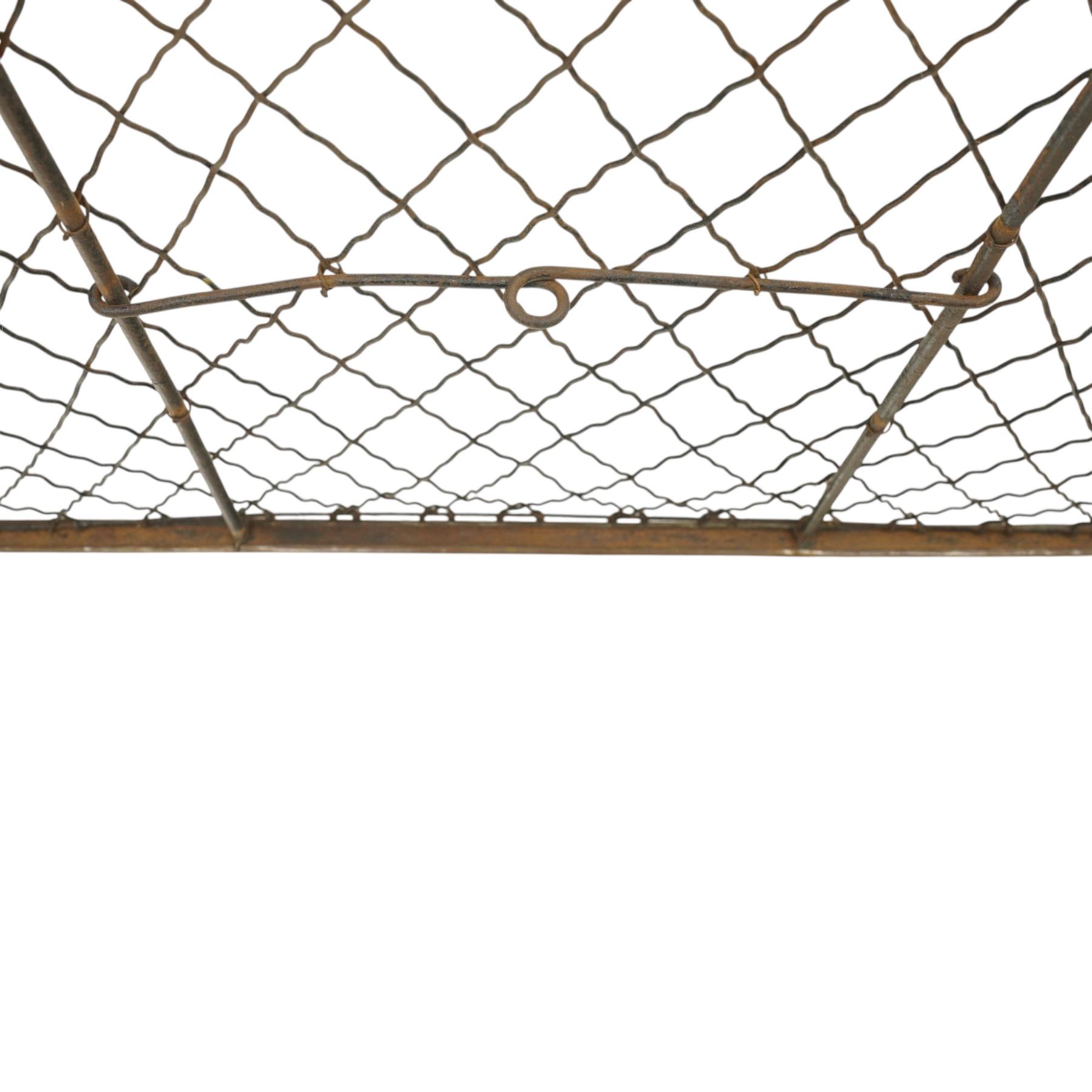 19th century large wrought iron nursery fire guard, of curved form with scrolled brace in the centre