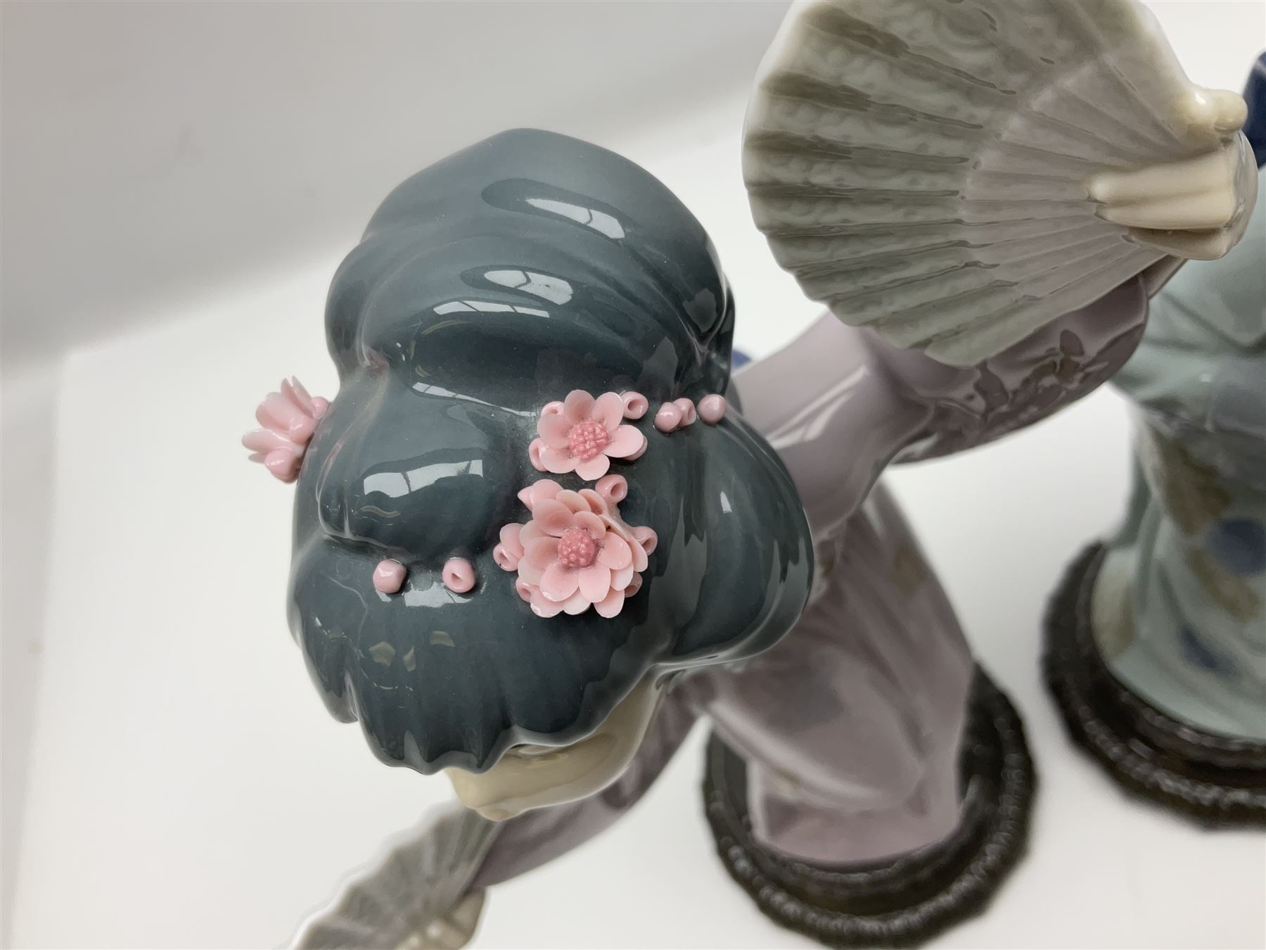 Three Lladro Japanese figures, comprising Sayonara no. 4989, Chrysanthemum no. 4990 and Madame Butterfly no. 4991, largest H30cm