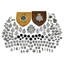  Police - large quantity of cap and collar badges, collar numbers and buttons for Hull City Police, Humberside Police, Lincolnshire Constabulary, York & North East Yorks Police etc; all queen's crown; and three helmet plates including one king's crown