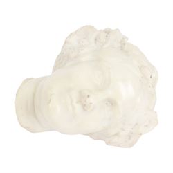 Fragmentary white marble head of a femal