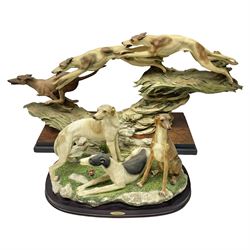 Two Giuseppe Armani Florence limited edition figure, comprising, Running Free by Giuseppe Armani no.715 of 3000 on plinth, and a figure of three greyhounds, largest H32cm, L60cm