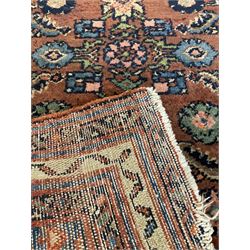 Small Persian rug or mat, decorated with Herati motifs within pattern borders 