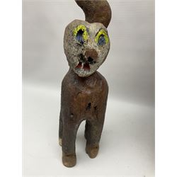 Helen Skelton (British 1933 – 2023): Three carved wooden abstract sculptures, each modelled as a cat, with carved or painted features, largest H63cm. Born into an RAF family in 1933 in Kent and travelled the world extensively during her childhood. After settling in Bridlington, Helen immersed herself in painting, textiles, and wood sculpture, often inspired by nature's beauty. Her talent was showcased in a one-woman show at Sewerby Hall and recognised with the sculpture prize at Ferens Art Gallery in 2000. Sadly, Helen’s daughter passed away from cancer in 2005. This loss inspired Helen to donate her sculptures to Marie Curie upon her passing in 2023.