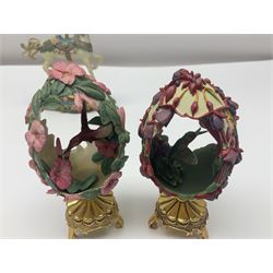 Six Franklin Mint House of Faberge garden eggs, to include Garden of Joy, Beauty in the Garden, Jewels in the Garden, Garden Majesty, Splendour in the Garden and Rainbow in the Garden, together with a Franklin Mint Carousel Rose Clock, all with certificates of authenticity, clock H16.5cm