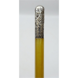  19th century Chinese swagger stick possibly Rhinoceros Horn, silver pommel embossed with figures amongst foliage, L74.5cm   