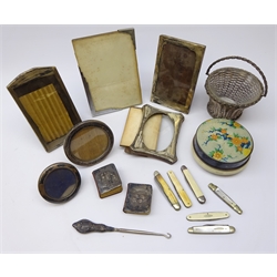  Three hallmarked silver photo frames, Art Deco chrome plated photo frame, two silver fronted pocket bibles, silver-plated woven swing handled basket, mother-of-pearl and other pocket knives & miscellanea in one box  