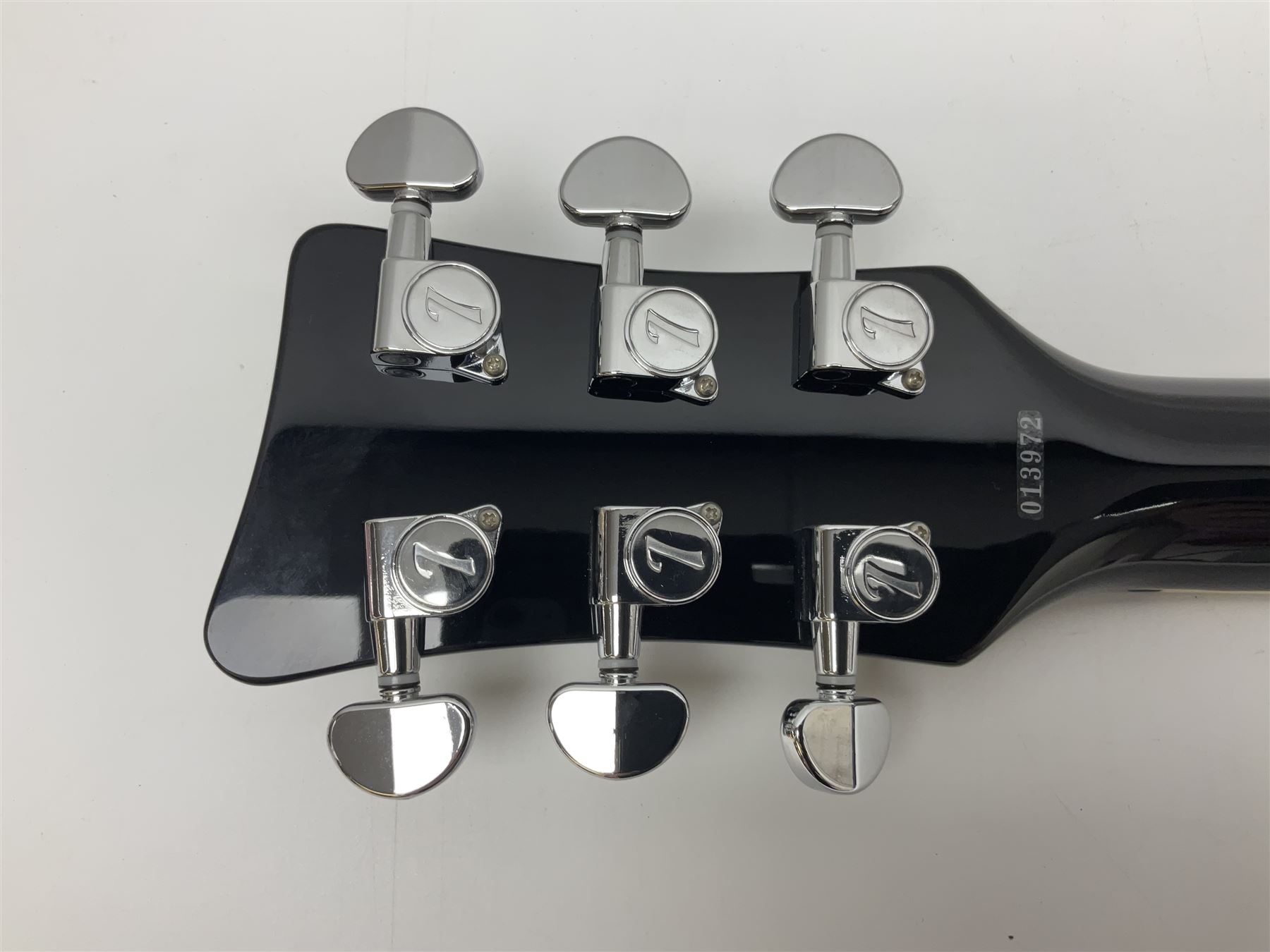 Italia Maranello Speedster electric guitar in black and white, serial no.013972; L99cm; in Italia soft carrying case; together with a boxed TGI 3491 guitar stand