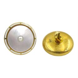 Set of four gold mother of pearl, white enamel and split pearl shirt buttons, stamped 18ct, in fitted case