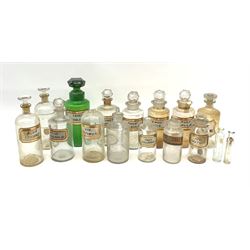 A group of late 19th/early 20th century glass chemist bottles, to include a green glass example, various labels including 'Tinct: Lupuli (Humili)', 'Croc: Stic', 'Tinct Calumbae', etc. 