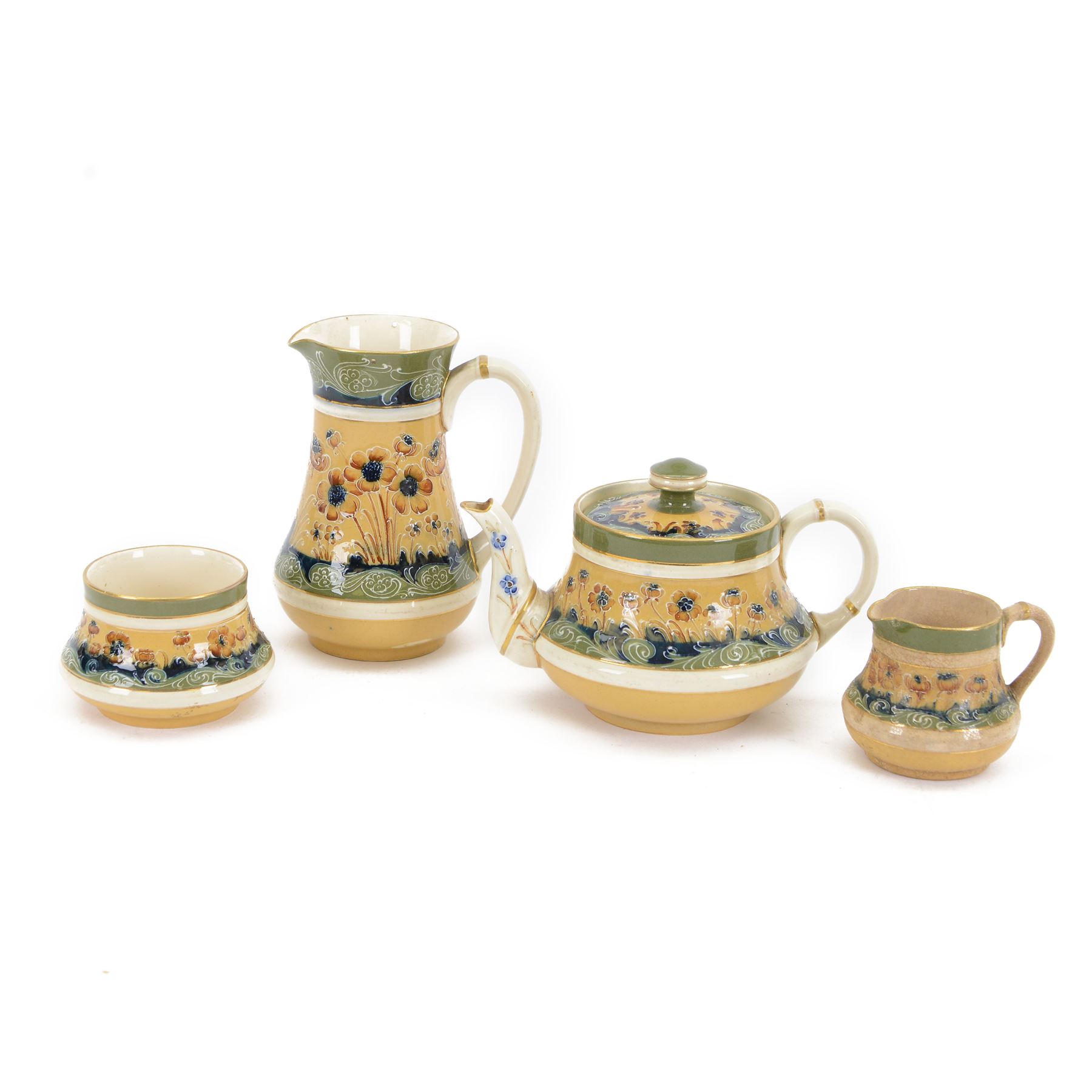 William Moorcroft for James Macintyre & Co Florian Ware tea service, in poppy pattern, comprising teapot, hot water jug, milk jug and open sucrier, all with printed mark beneath, teapot H12cm  