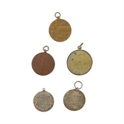 Collection of Japanese WWI and WWII badges and medals, including veteran badges 