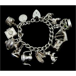 Silver curb link bracelet, with thirteen silver charms including squirrel dog, crown, chip , house, stone set fobs, boot and ship