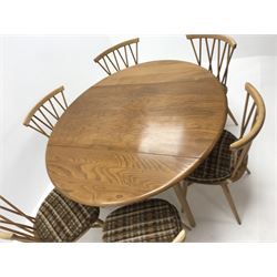 Ercol drop leaf table, square tapering outsplayed supports (W125cm, H72cm, D113cm) and set six stick back chairs, turned supports (W42cm)