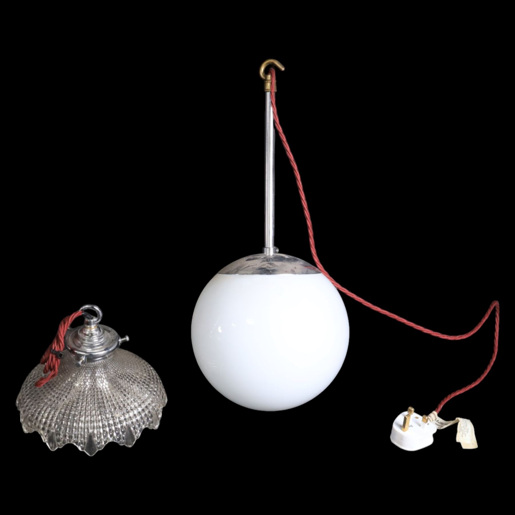 White glass ceiling lights, together with another glass shade  