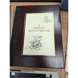 Collection of Disney animation and drawing books, including Walt Disney's Nine Old Men flipbooks, three Nine Old Men reference books, Marc Davis Walt Disney's Renaissance Man, A Disney Sketchbook and The Illusion of Life (7)