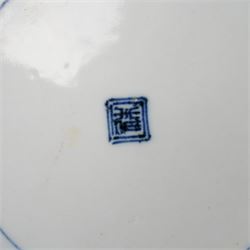 Pair of Japanese Edo period Ko Kutani dishes, decorated in green, yellow, blue iron-red, and aubergine enamels, the centres painted with a singing bird perched on a rock among foliage, within a border of alternating geometric designs and a chocolate-brown rim, the reverse with underglaze blue foliage, Fuku mark, D20.8cm (2) A matching pair of dishes is held in the collection of the Cleveland Museum of Art (see accession no. 1964.262)