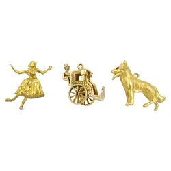 Three 9ct gold pendant/charms including dancer, wolf and carriage, all hallmarked