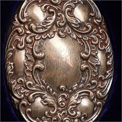 Victorian silver backed six piece dressing table set  with embossed decoration and engraved with initials in original case Chester 1900 Maker Charles Cooke