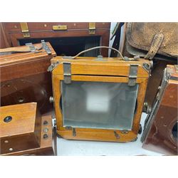 Collation of folding plate cameras of various sizes folding plate in mahogany and lacquered brass, together with camera plates and slides
By vendors repute some slide are from the Gandolfi workshop