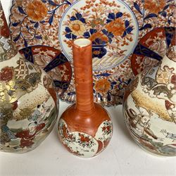 Collection of Japanese ceramics comprising pair of Satsuma vases decorated with panels depicting children and samurai figures, together with a Kutani vase painted with birds and flowers, all with painted character marks beneath, and an Imari plate, largest vase H31cm