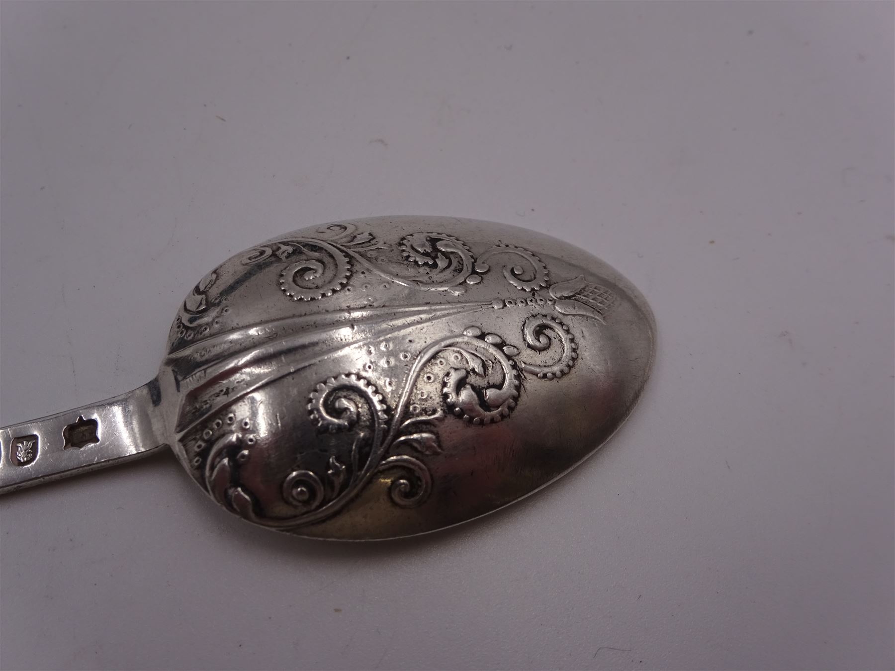 Five Irish silver spoons, comprising Old English pattern table spoon, hallmarked Dublin 1799, maker's mark JK, pair of George IV Fiddle pattern teaspoons, hallmarked James Scott, Dublin 1824 and two other Fiddle pattern teaspoons, the first example hallmarked Dublin 1837 and the second example hallmarked Dublin 1827, both maker's marks worn and indistinct, together with an early 20th century Britannia Standard silver teaspoon, with beaded scroll decoration and rattail bowl, hallmarked Thomas Bradbury & Sons, London 1903