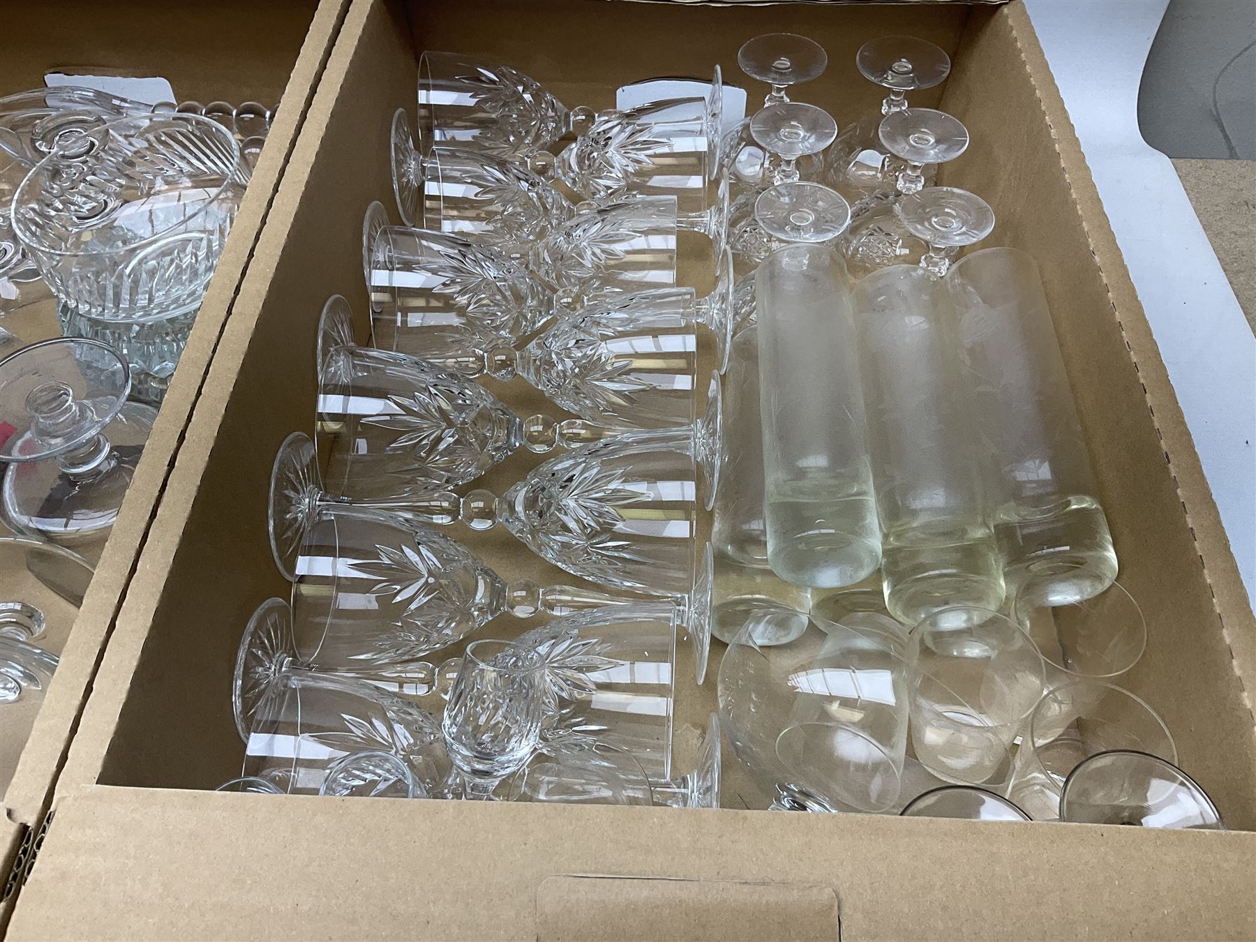 Seven boxes of glass to include sets of drinking glasses, decanters