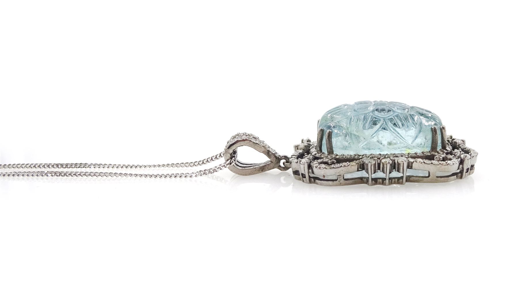 Silver carved aquamarine and diamond pendant necklace, stamped 925, aquamarine approx 12.45 carat, total diamond weight approx 1.05 carat