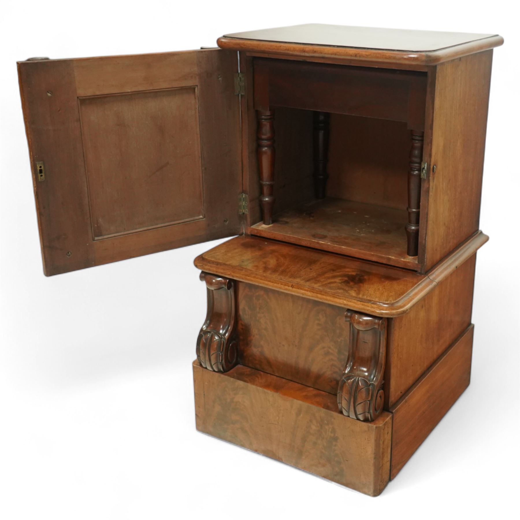 Victorian figured mahogany commode with enclosed bidet, upper cupboard with barley twist supports above sliding and hinged seat elements with leather panels, on plain plinth base