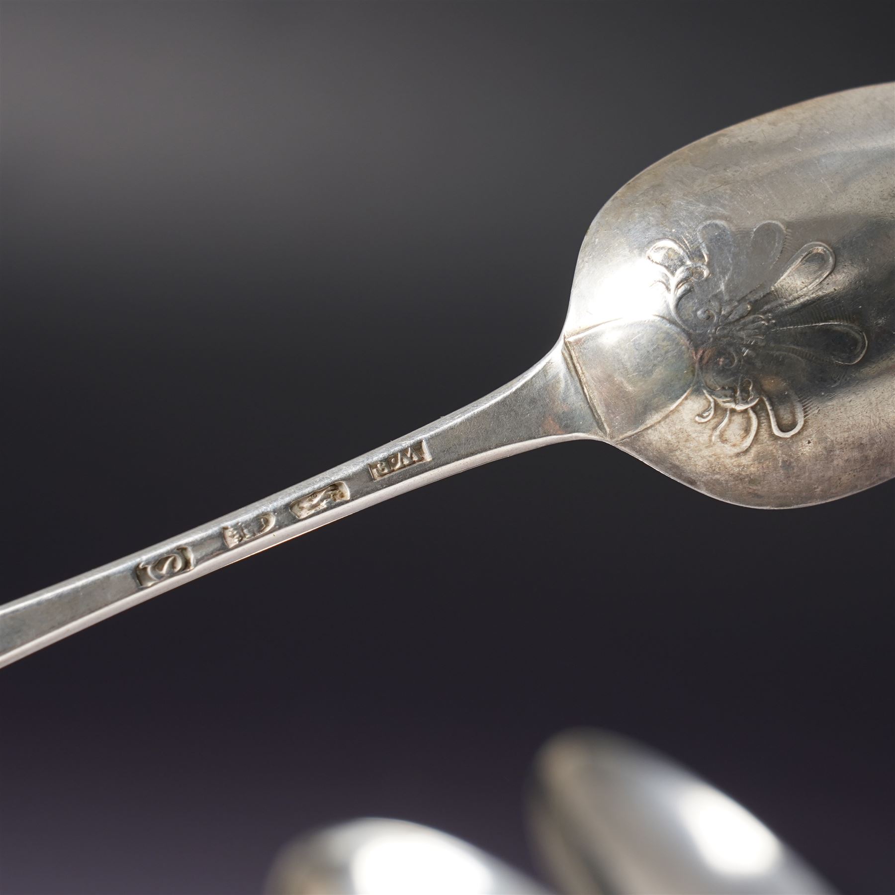 George III silver bright cut table spoon London 1781 Maker Hester Bateman, another London 1782 Maker Thomas Wallis I and three others (5)