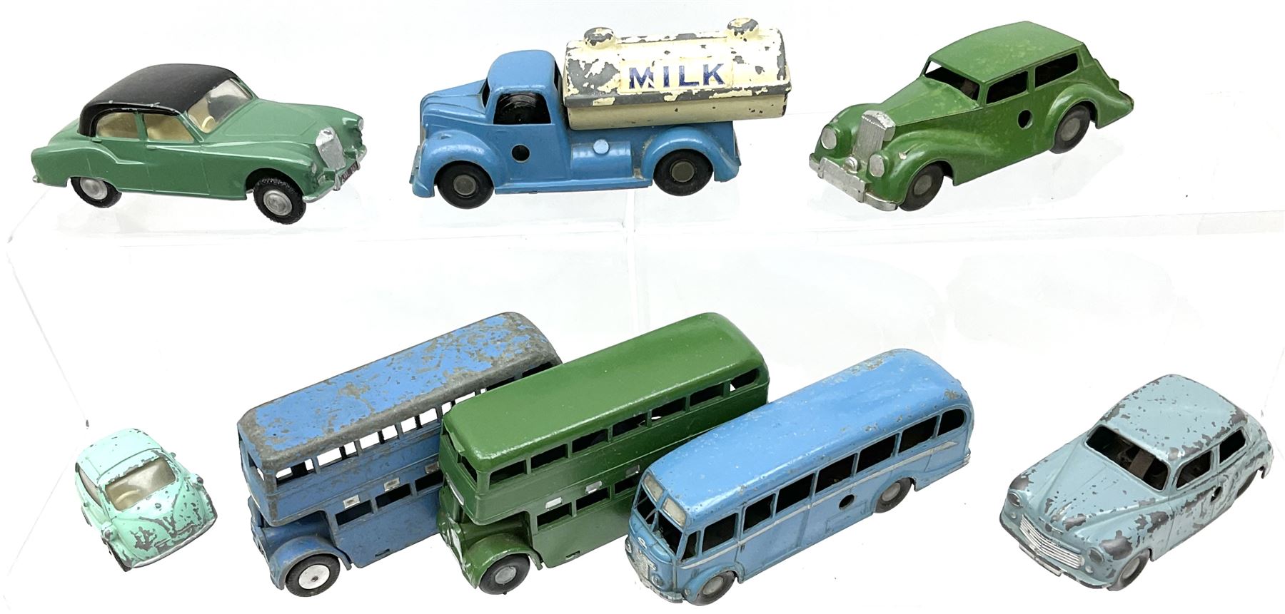 Chad Valley Wee-Kin - six unboxed and playworn clockwork models comprising Milk Tanker; Hillman Minx and another saloon car; Commer Avenger Coach; and two double deck buses; together with Tri-ang Spot-On Armstrong Siddeley Sapphire and BMW Isetta bubble car (8)
