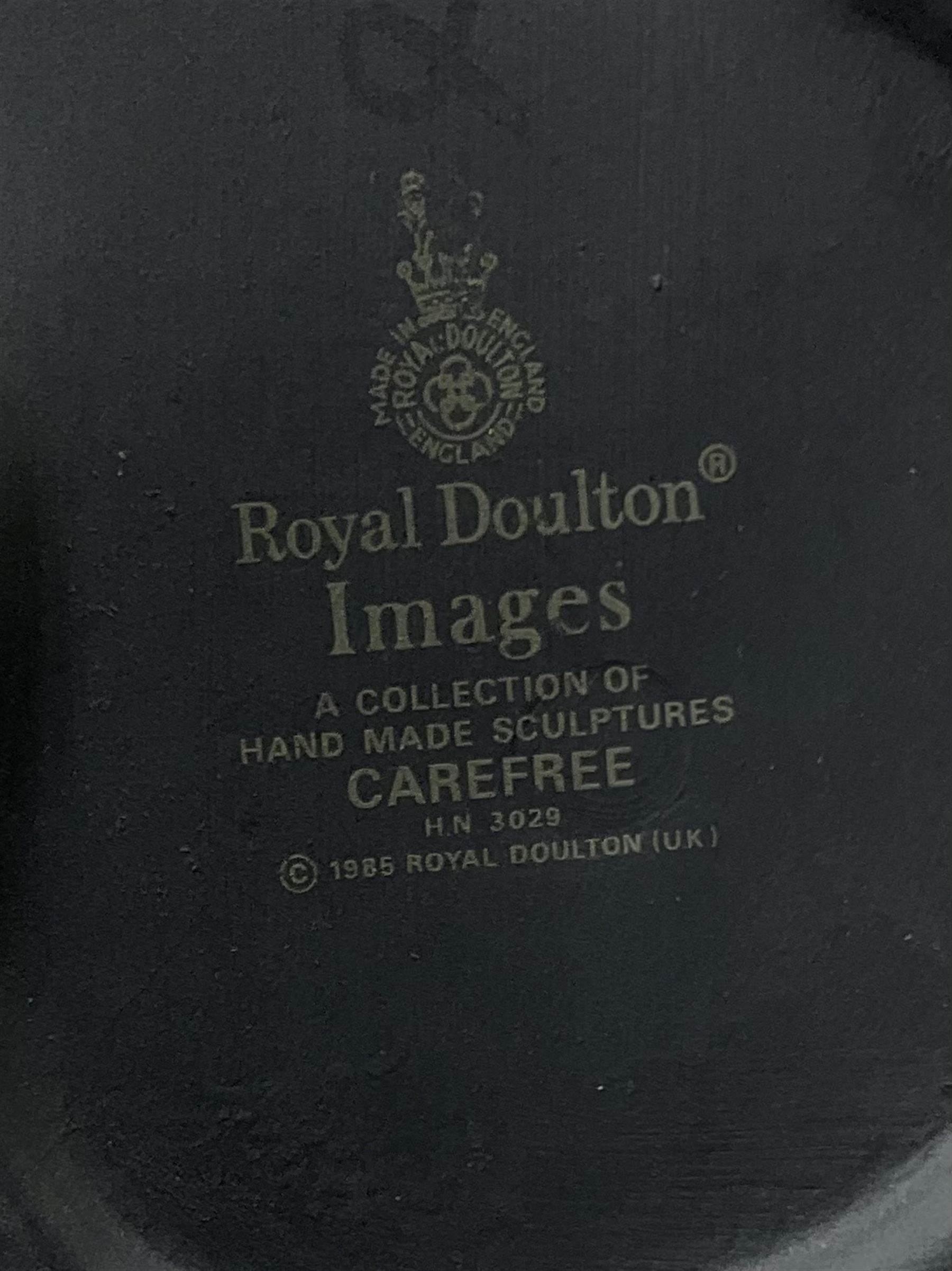 Four Royal Doulton Images figures comprising 'Happy Anniversary', 'Wedding Day', 'Congratulations' and 'Carefree', together with a set of three Heinrich collectors plates depicting Fairies.