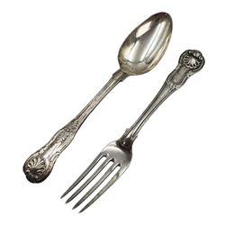 George IV silver Kings pattern dessert spoon, hallmarked William Chawner II, London 1825, together with a similar George IV silver fork, hallmarked London 1830, maker's mark worn and indistinct