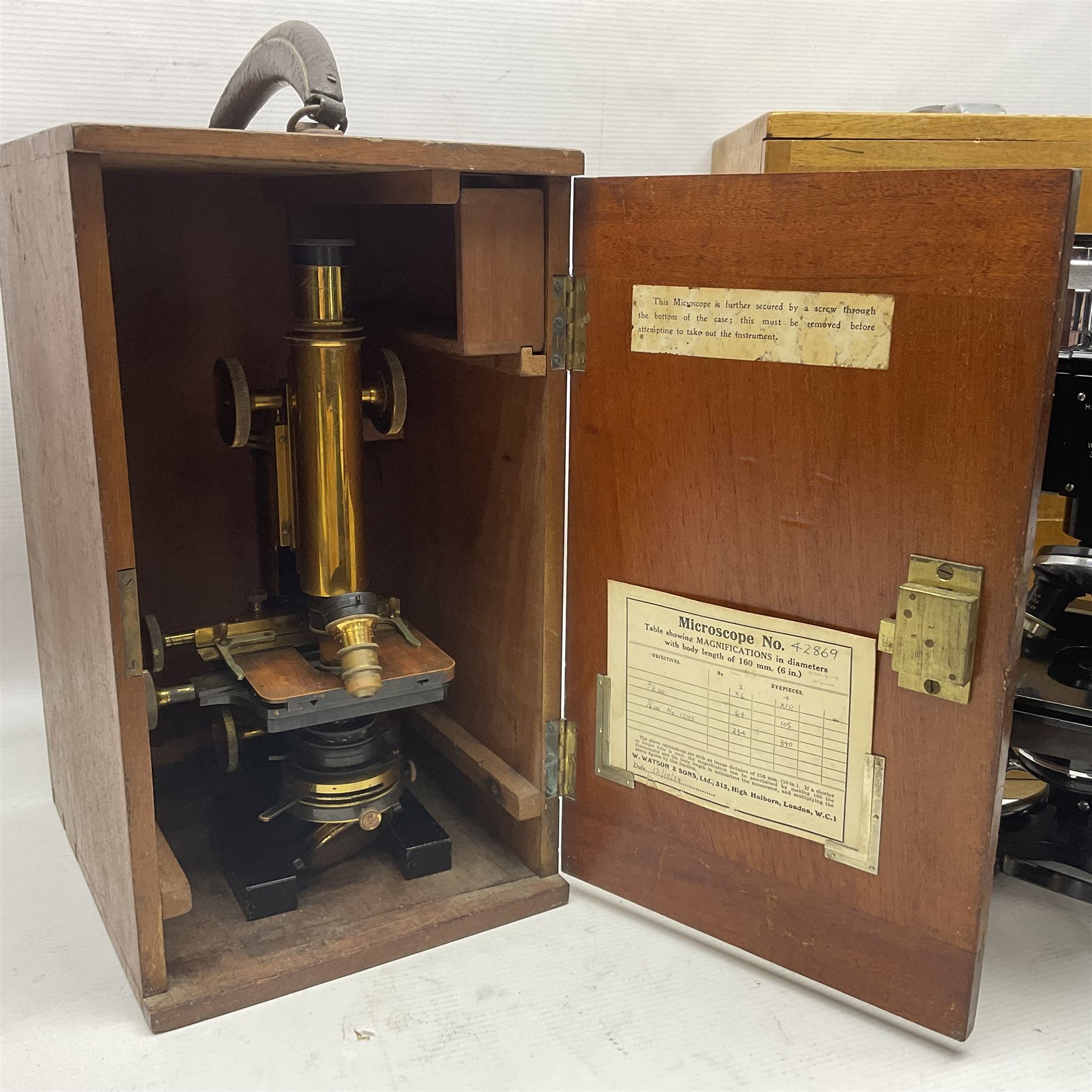 Three W. Watson & Sons microscopes, comprising Kima no 58173, Low power binocular no 98846 and High power binocular no 103144, all boxed 