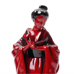 Royal Doulton flambe figure 'The Carpet Seller' HN2775 and another exclusively for the Collectors Club  'Geisha' HN3229 (2)