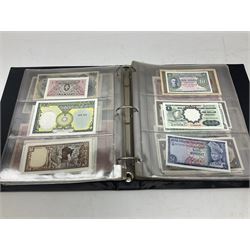 World banknotes, including Queen Elizabeth II The States of Jersey one pound 'DB202703', five pounds 'BB527762' and ten pounds 'AB651481', reserve bank of New Zealand two dollars '1L3 741894', King George V Straits Settlements one dollar 1st January 1935 'F/83 28924', various Bank of England notes etc, housed in two ring binder albums