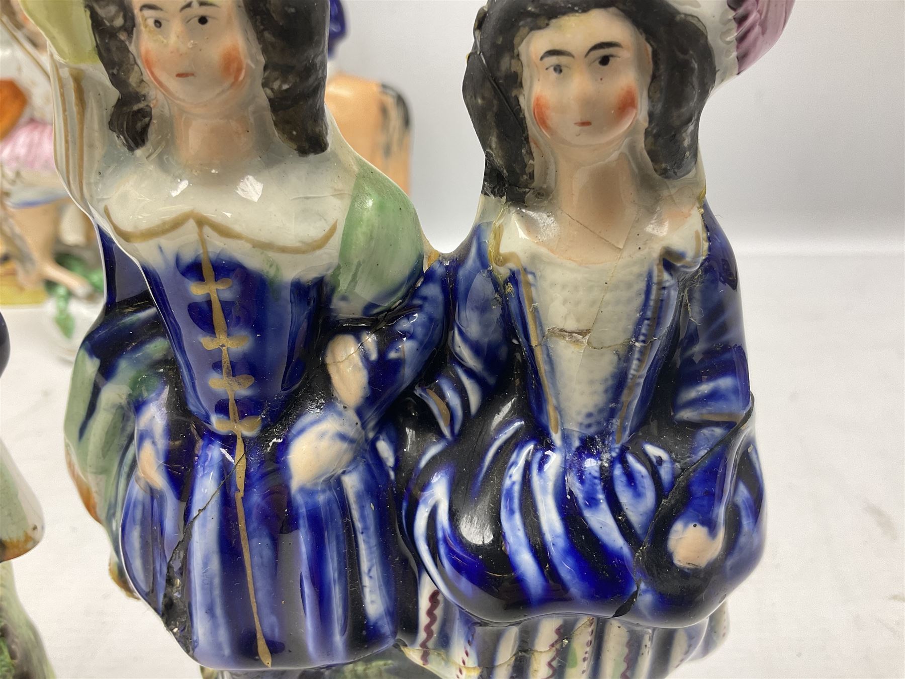 Quantity of Victorian and later Staffordshire style figures, to include examples upon horseback, sheep, drummer etc