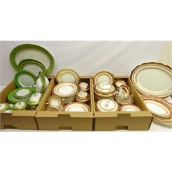  Ashworth Bros part dinner service, with gilt and green borders and a similar Bishop dinner service, for twelve persons, missing two soup bowls, including a graduating set of five oval platters in three boxes  
