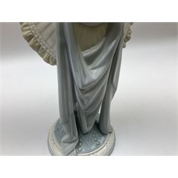 Lladro bust, Girls Head, modelled as bust of girl with 1920s hairstyle, elongated neck and feathered hat on a column, no 5153, year issued 1982, year retired 1983, H33cm