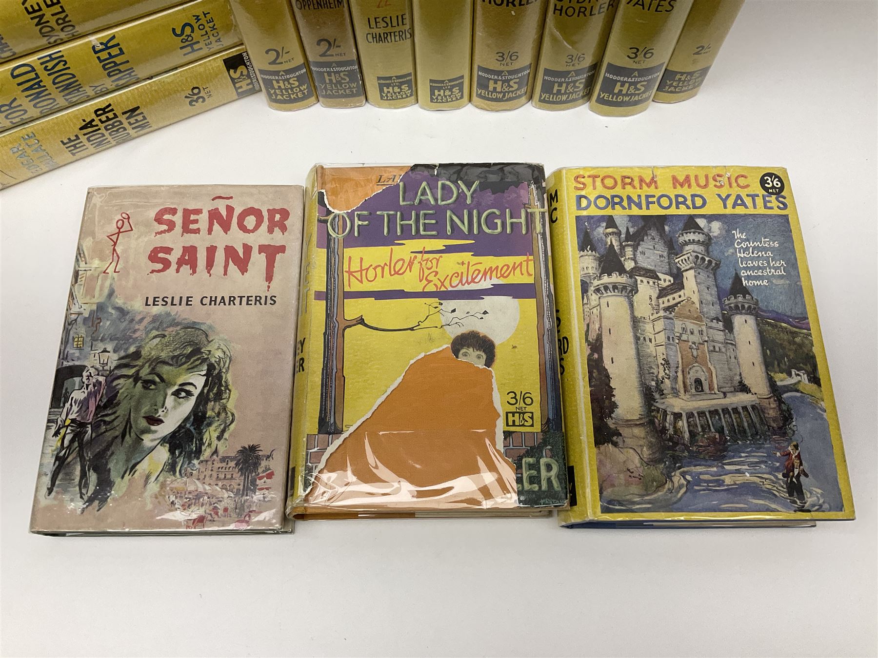 Collection of Hodder and Stoughton yellow jacket version books, to include Sydney Horler, George Goodchild, Dornford Yates, Leslie Charteris etc 