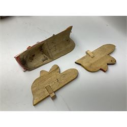 Sri Lankan Cobra mask depicting the demon Naga Raksha, together with a smaller example, largest H46cm