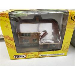 '00' gauge - quantity of trackside buildings kits by Metcalfe Superquick, Faller, Airfix, Dapol, Hornby etc in original packaging; and Scenix Old English Farmhouse building; boxed